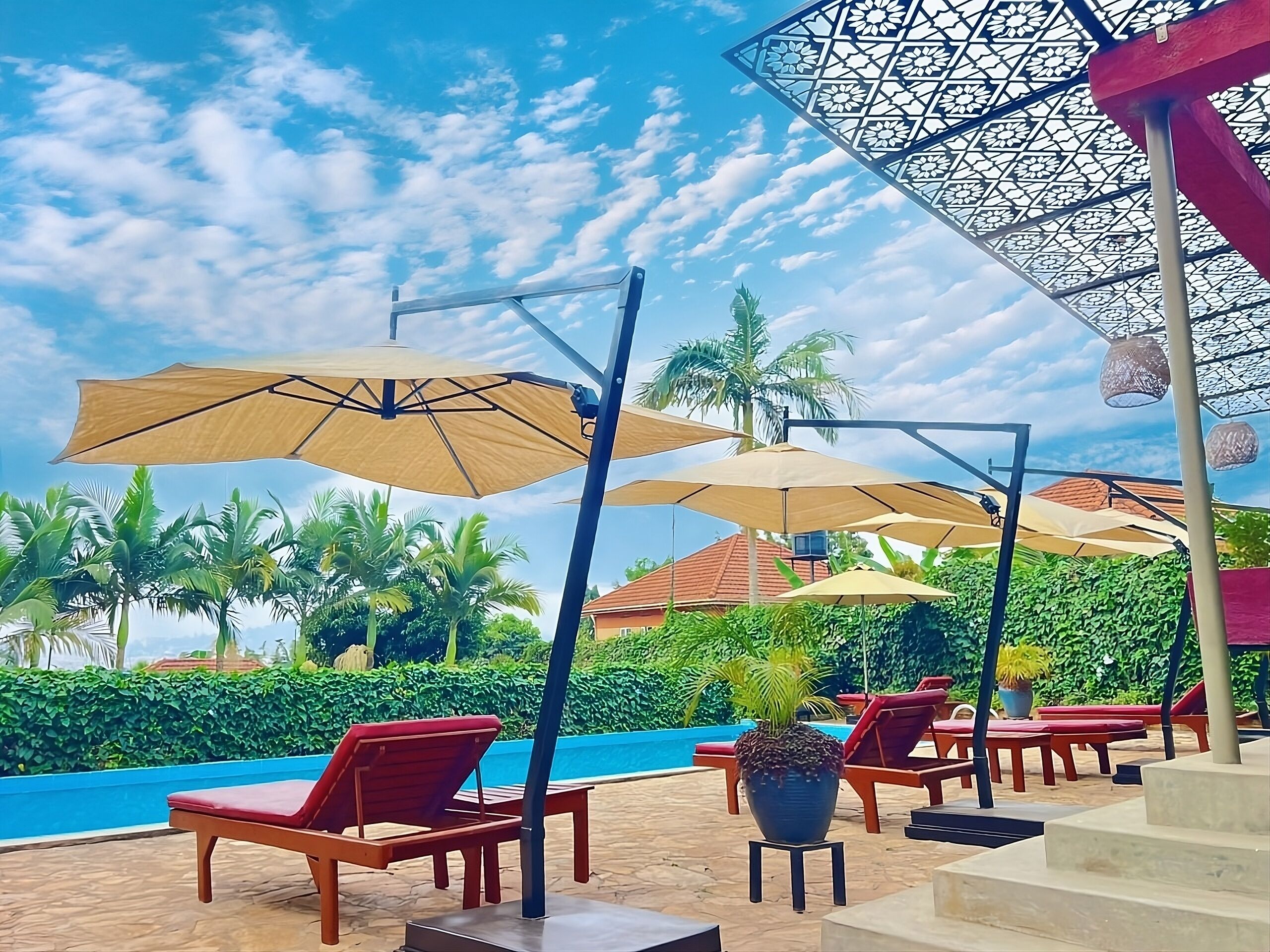 Outdoor pool, open 7:30 AM to 6:00 PM, pool umbrellas, pool loungers