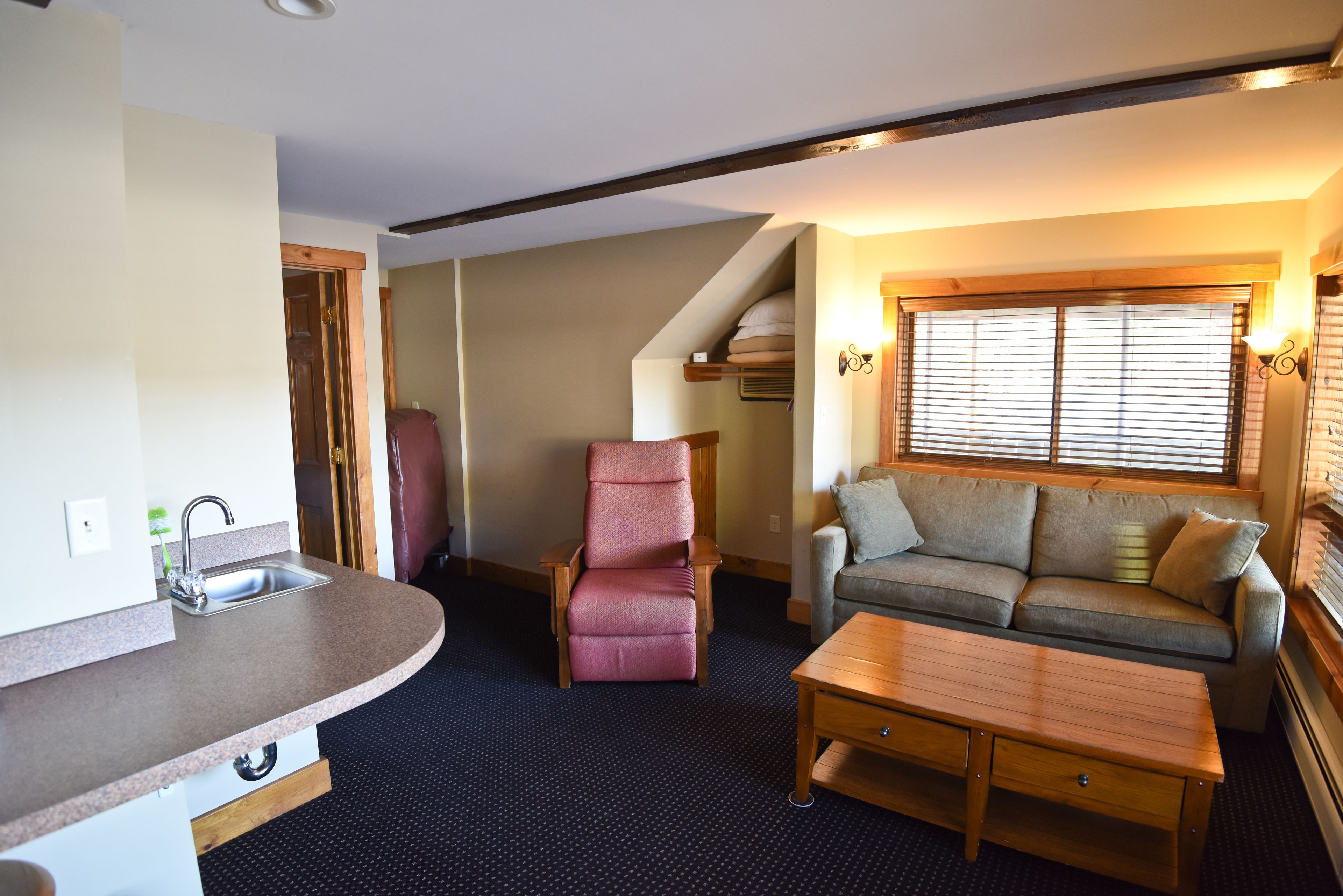 junior suite, mountain view (not pet friendly) | living area | flat-screen tv