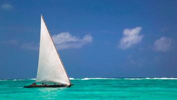 On the beach, white sand, beach shuttle, sun loungers