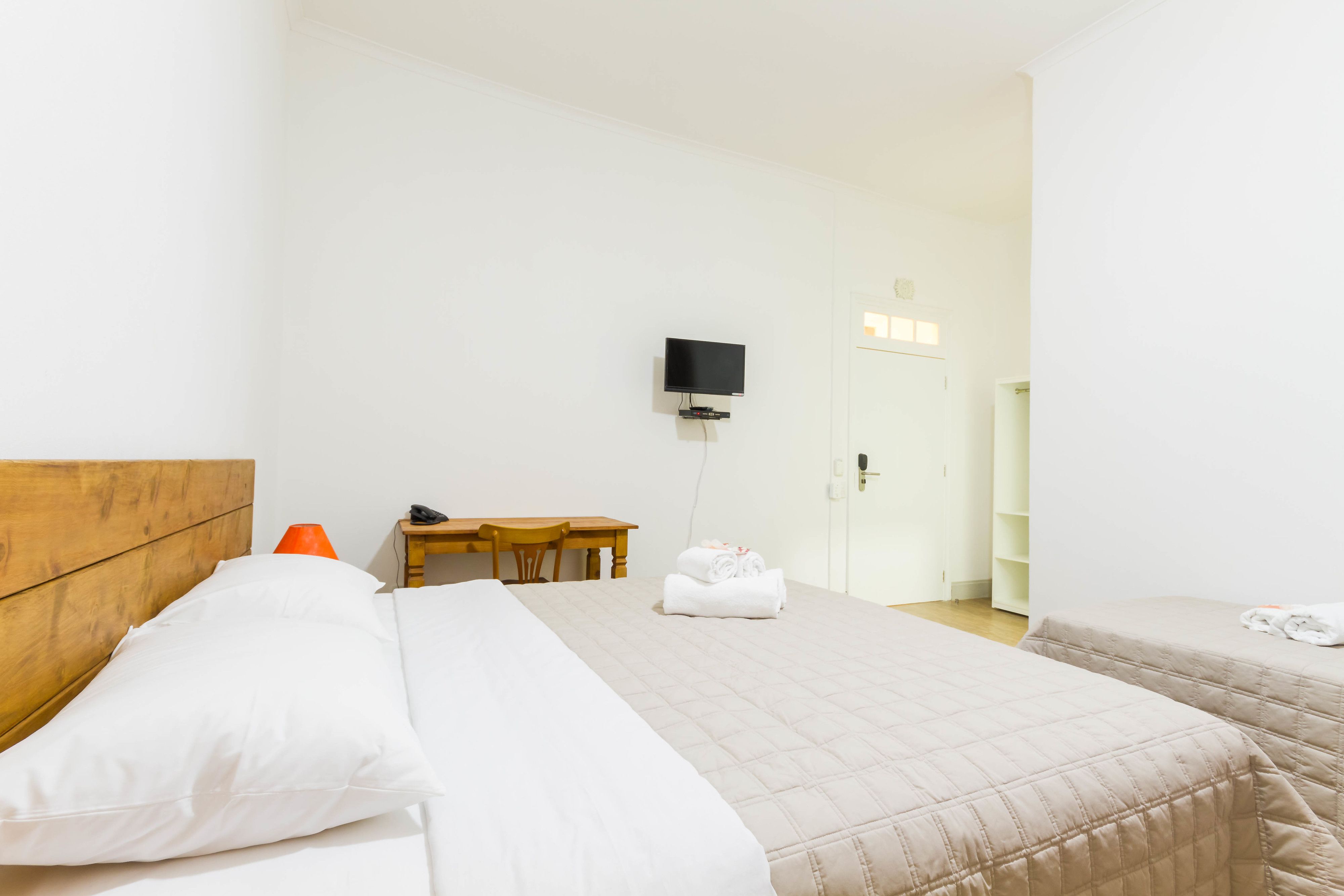 luxury triple room | minibar, in-room safe, desk, blackout curtains