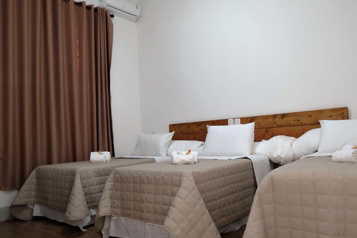 luxury triple room | minibar, in-room safe, desk, blackout curtains