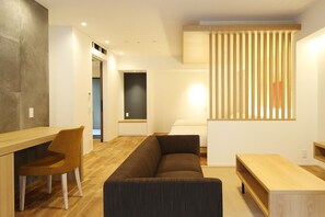 Superior Twin Room with Open-air Bath, Non-Smoking | Living area | Flat-screen TV