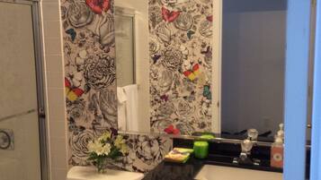 Combined shower/tub, hair dryer, towels, soap