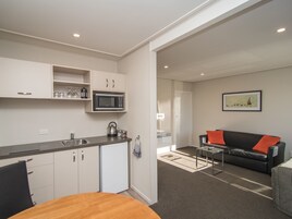 Standard One Bedroom Unit | Individually decorated, individually furnished, desk, iron/ironing board