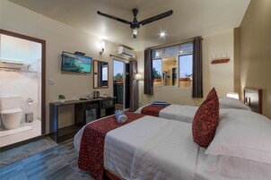 1 habitación, ropa de cama de alta calidad, cubrecamas y minibar 