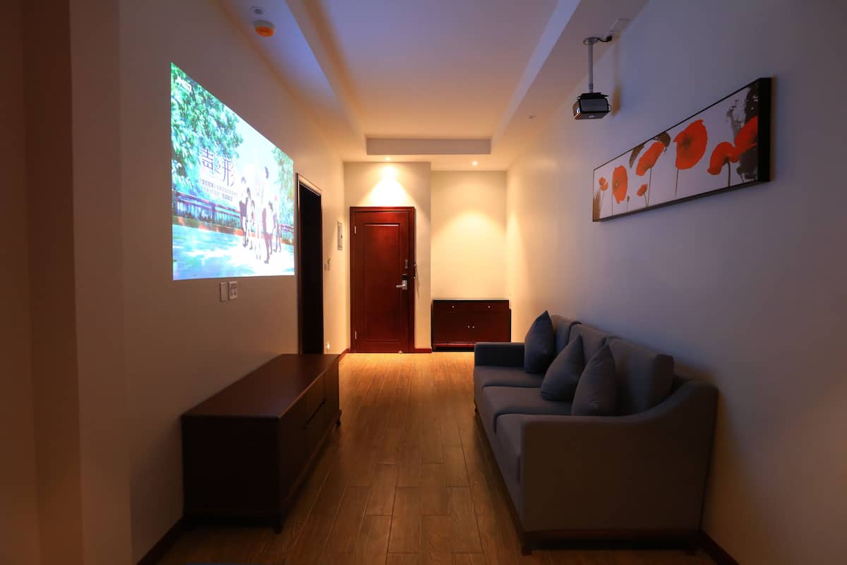 Premium Suite, 1 Bedroom | Living area | Flat-screen TV