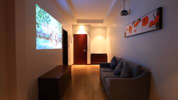 Premium-Suite, 1 Schlafzimmer | Wohnbereich | Flachbildfernseher