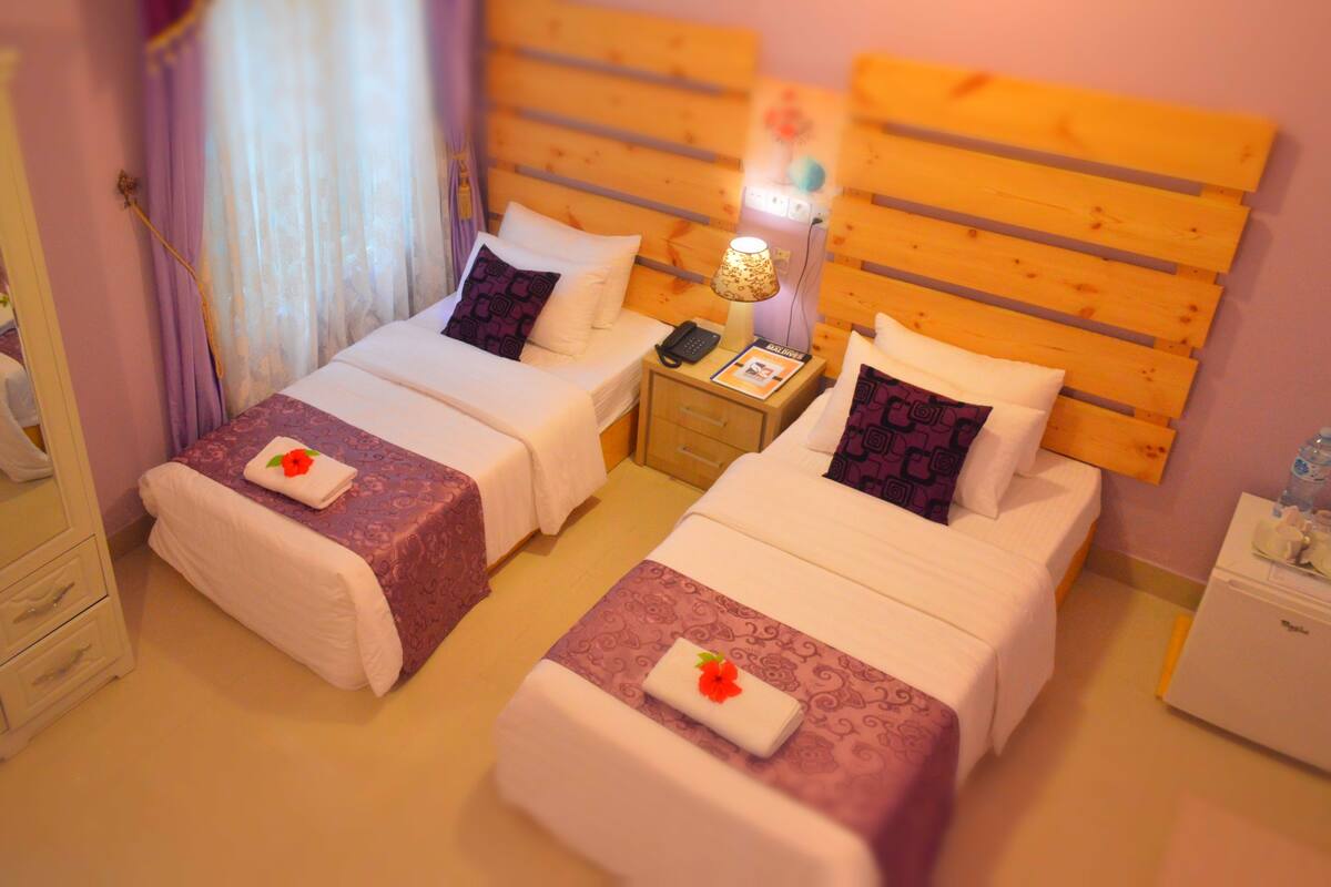 Superior Twin Room, 2 Bedrooms, Ground Floor | 4 bedrooms, minibar, in-room safe, desk