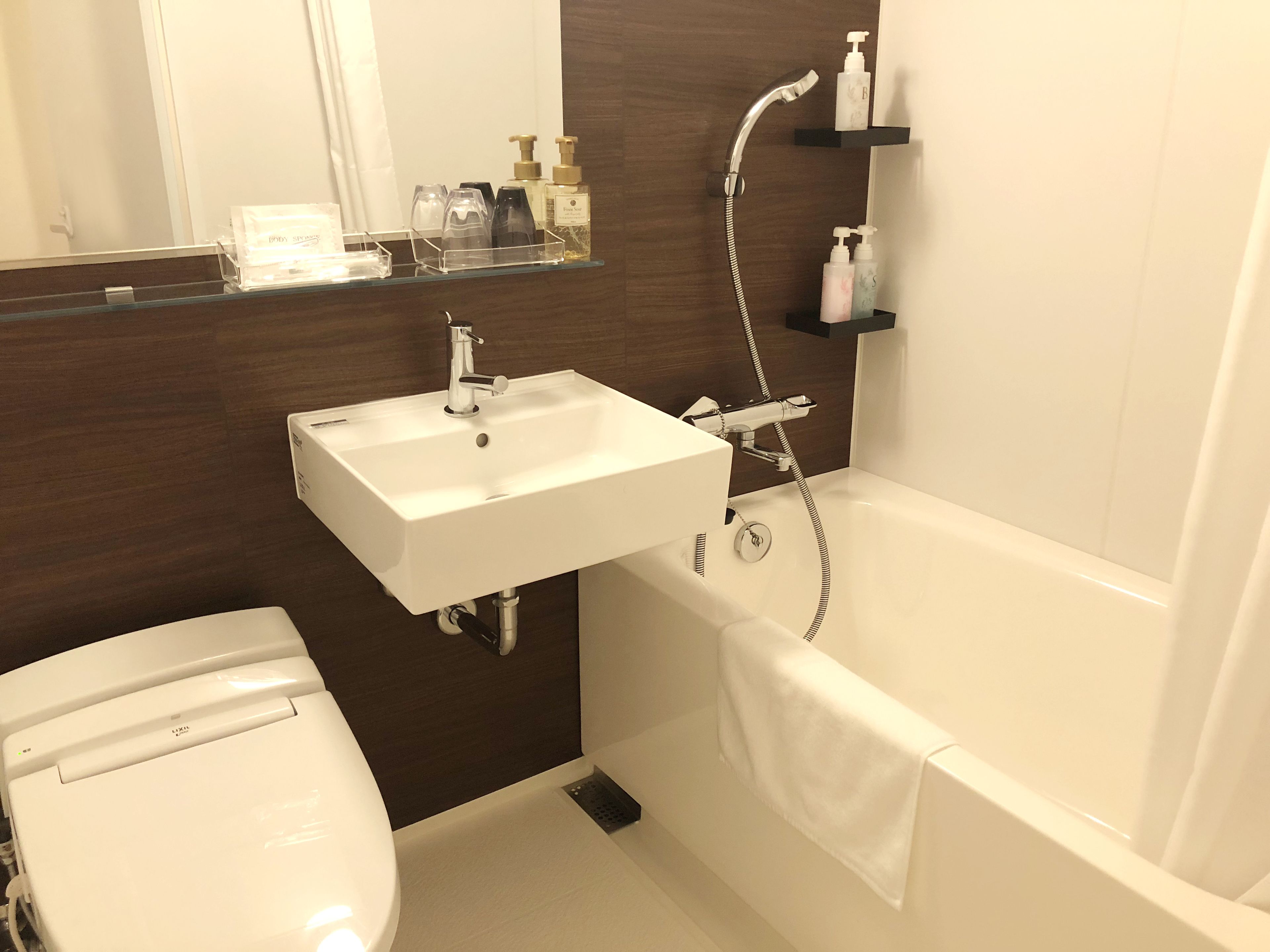 combined shower/bathtub, free toiletries, hair dryer, bathrobes