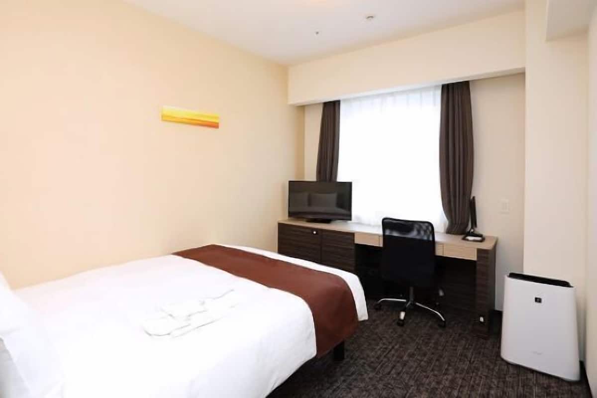 Down comforters, desk, blackout drapes, soundproofing