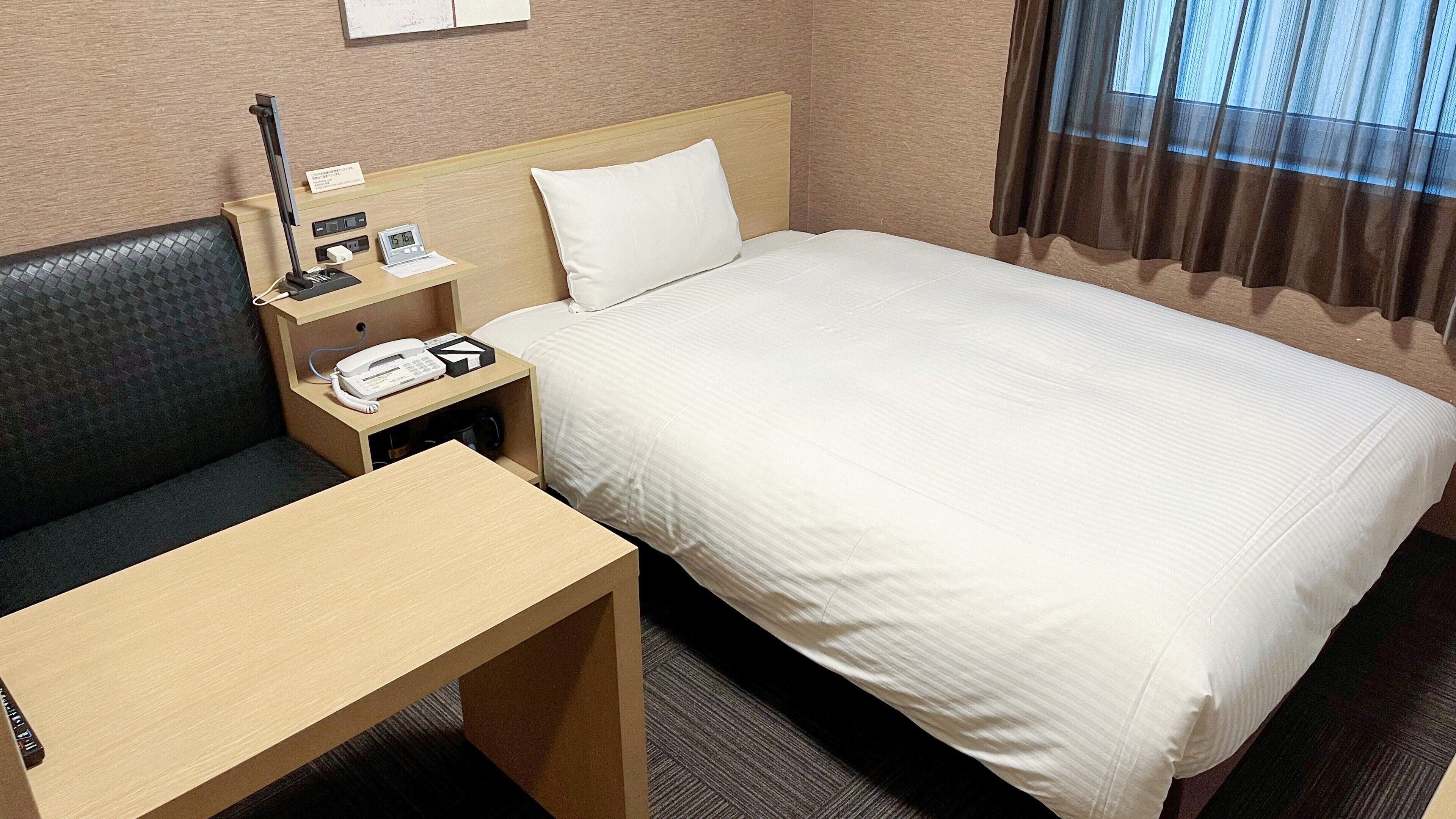 Desk, free WiFi, bed sheets