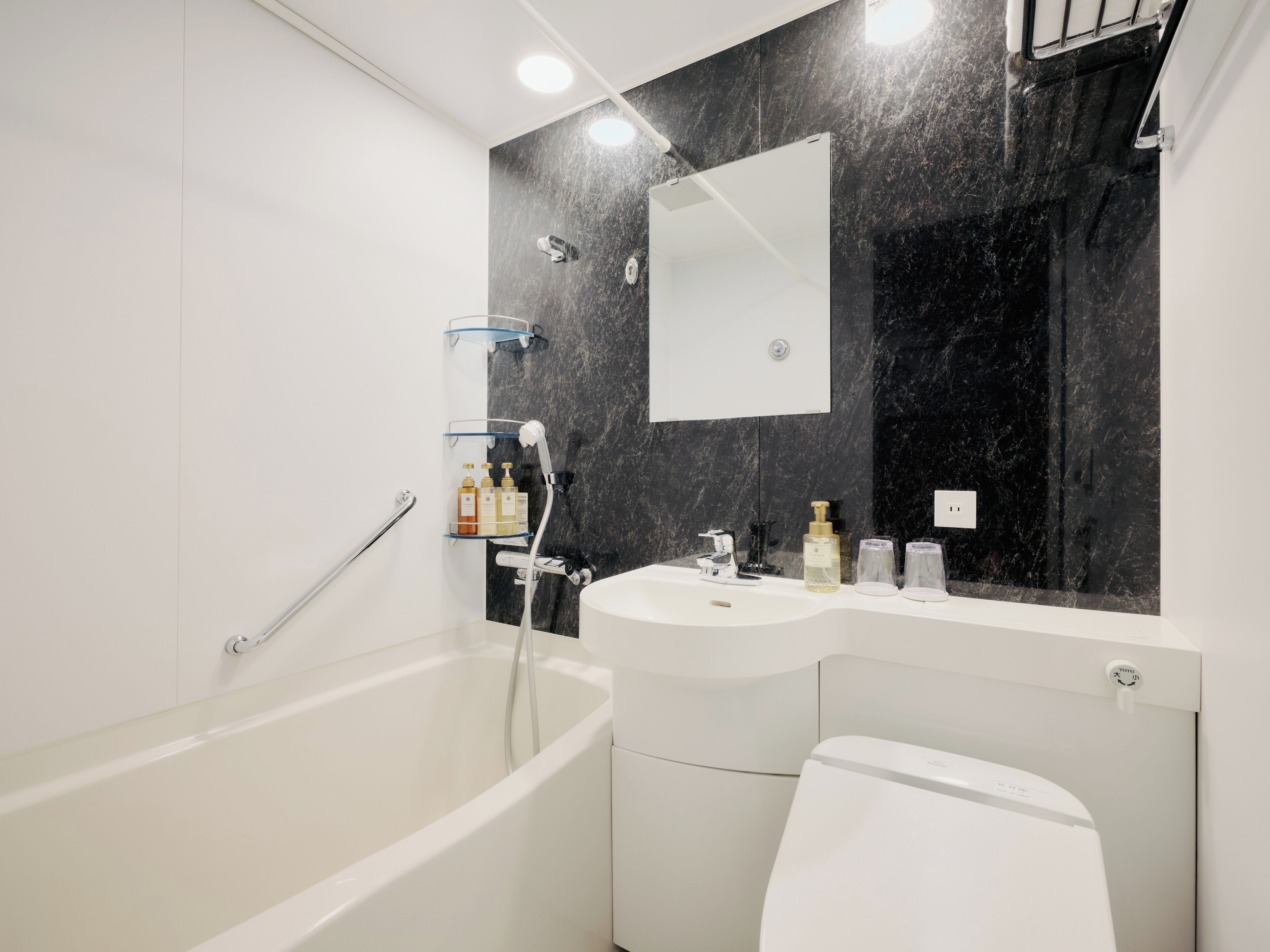 separate bathtub and shower, free toiletries, hair dryer, slippers