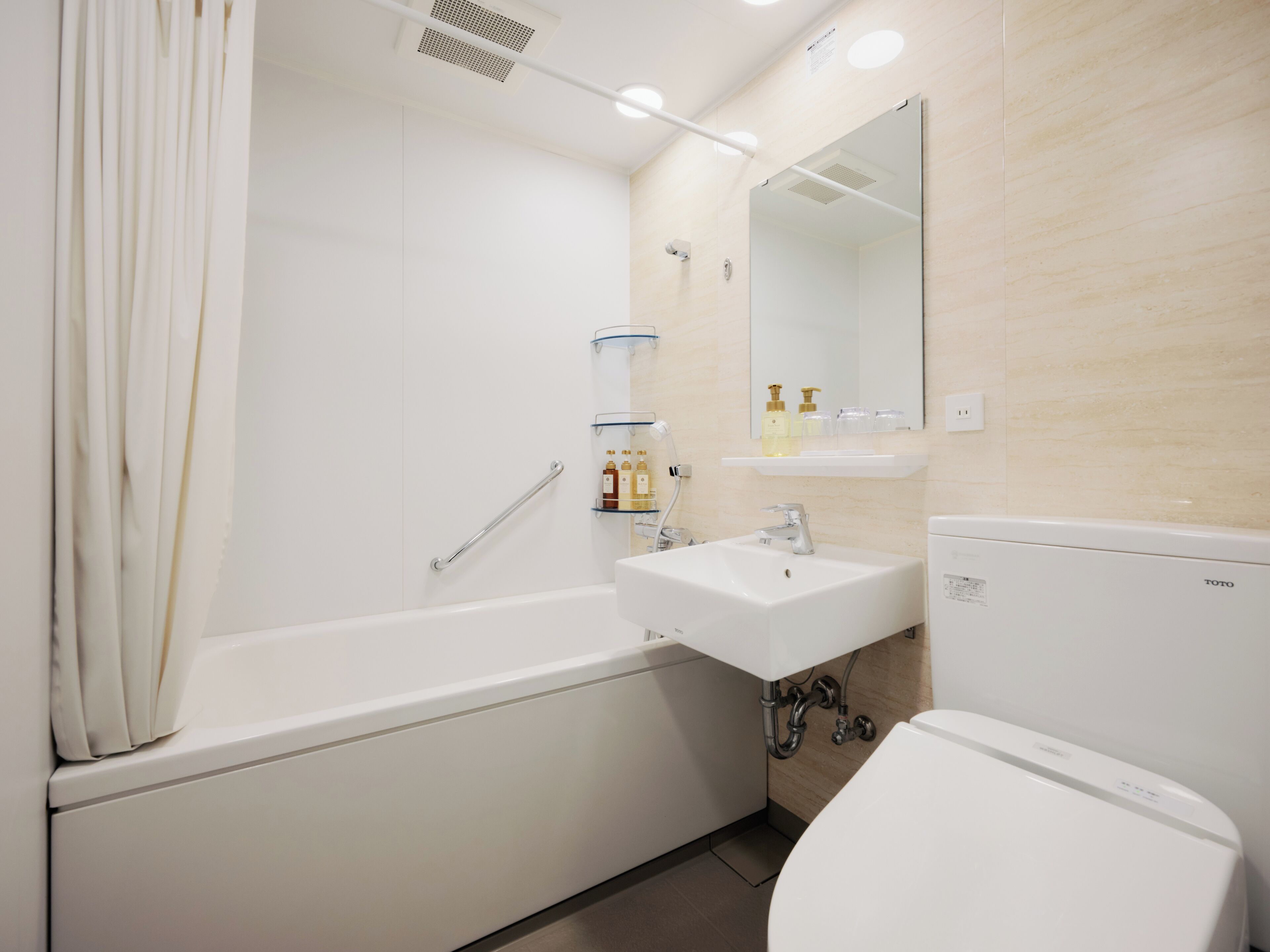 separate bathtub and shower, free toiletries, hair dryer, slippers