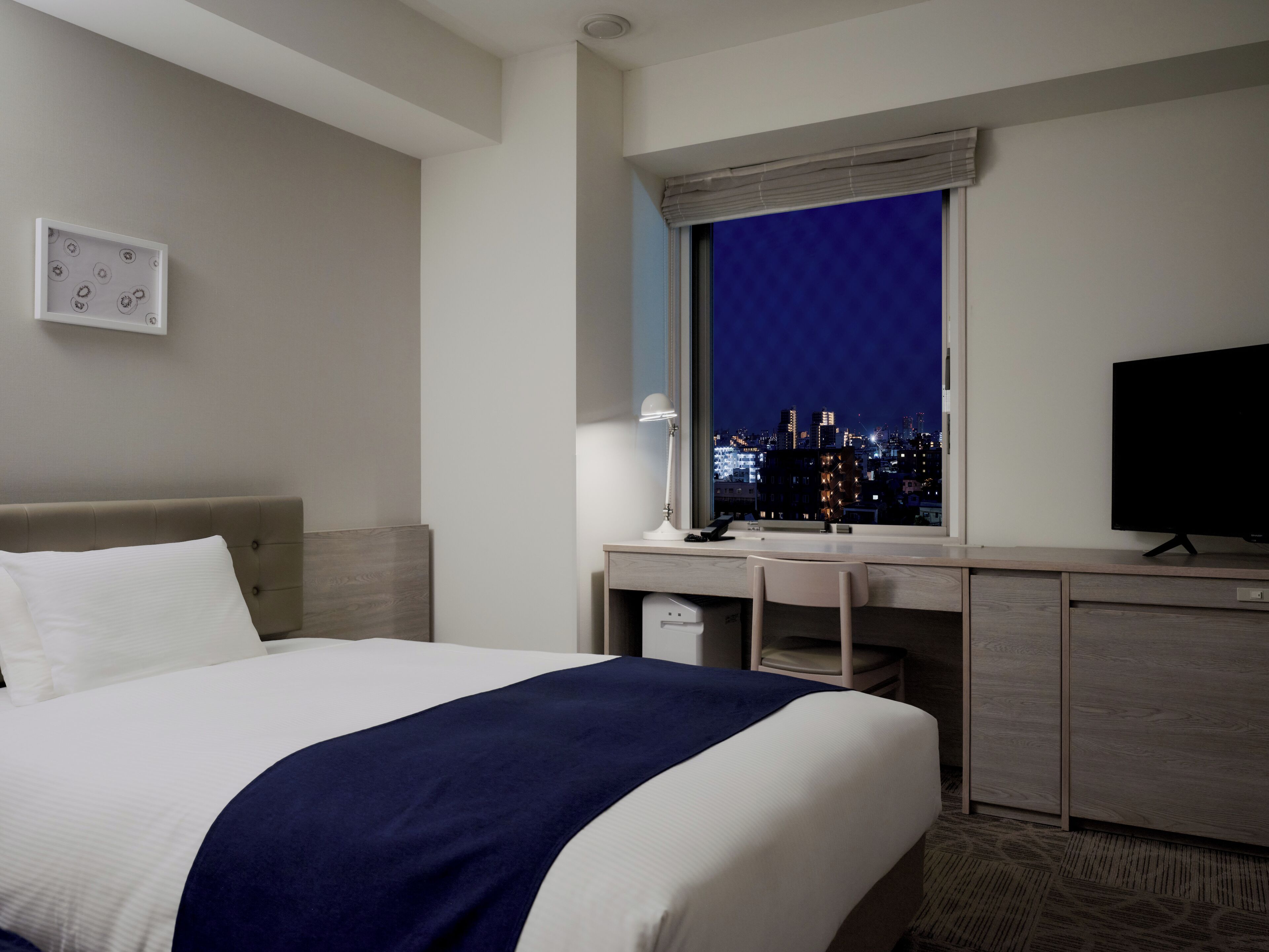 corner twin room | in-room safe, desk, iron/ironing board, free wifi