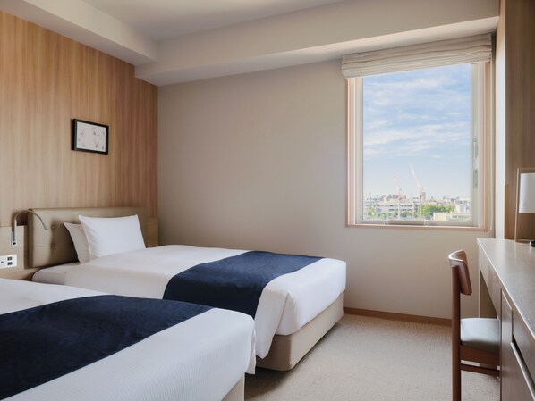 Coffres-forts dans les chambres, bureau, fer et planche à repasser