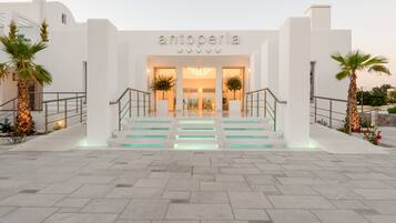 A modern building with the name 'antoperla' displayed above the entrance.