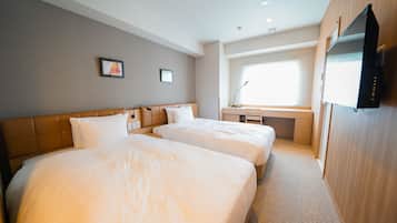 Een kluis op de kamer, een bureau, gratis wifi, beddengoed