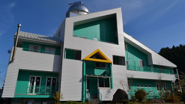 A modern building with a unique architectural design, featuring a prominent dome and a triangular entrance. - Auberge ALBIREO (Toyooka)