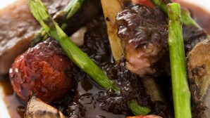 A close-up of a dish with various vegetables and meat. - Auberge ALBIREO (Toyooka)
