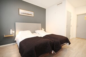 Family Room | Pillowtop beds, desk, blackout drapes, soundproofing