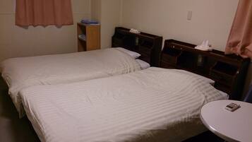 Desk, laptop workspace, blackout drapes, soundproofing