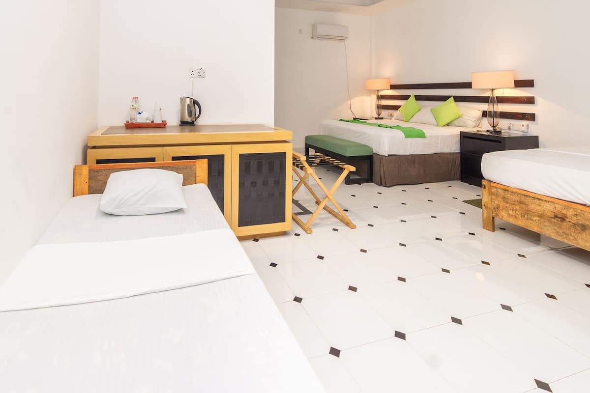 Premium bedding, desk, blackout drapes, soundproofing