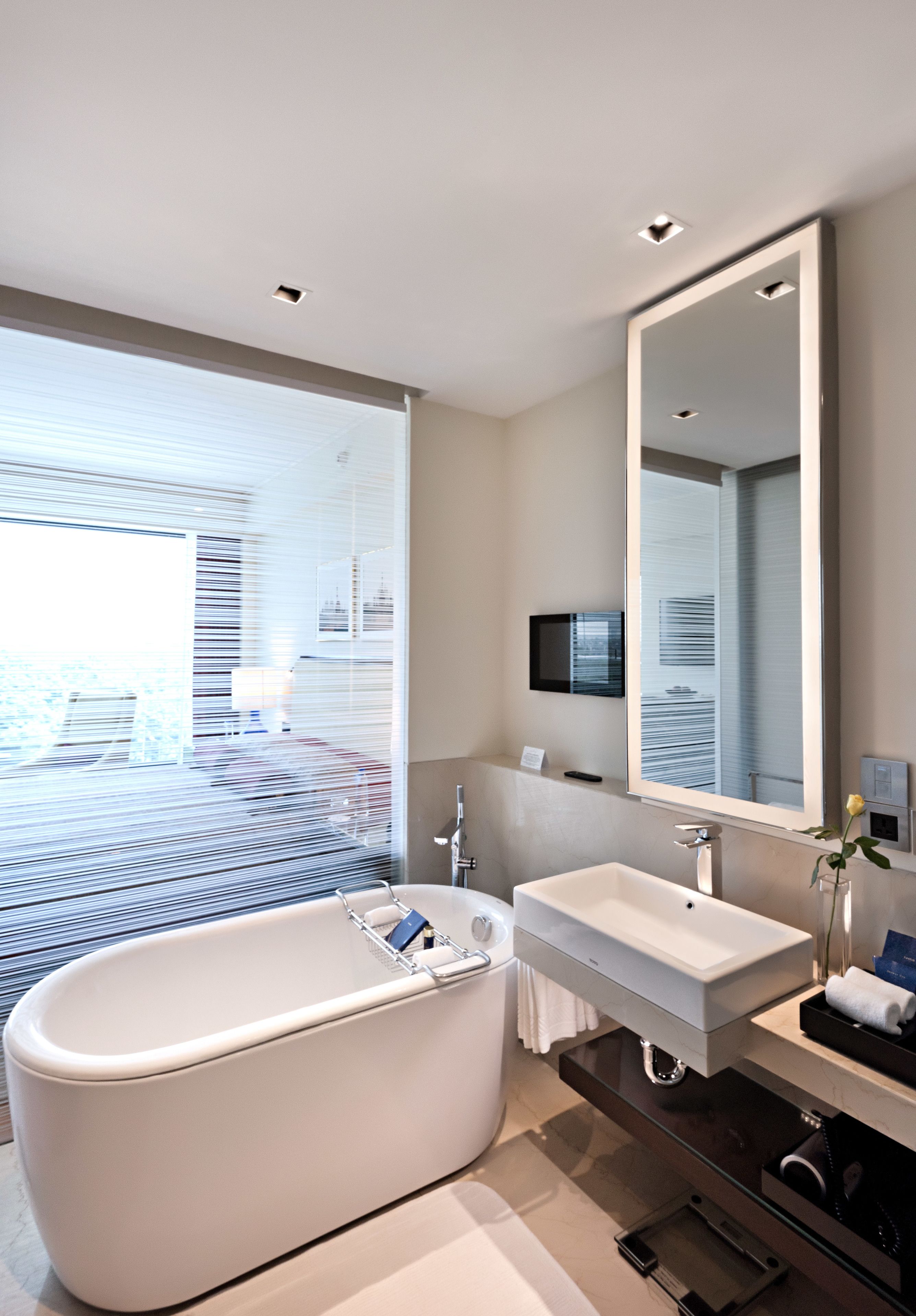 separate bathtub and shower, deep-soaking bathtub