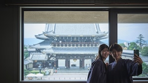 A room with a large window overlooking a traditional building. - Hotel Kuu Kyoto (Kyoto)