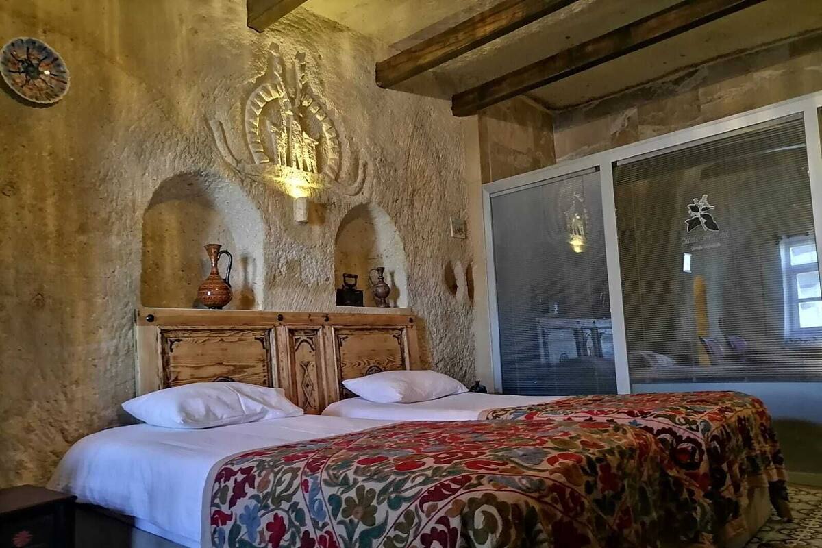 Standard Cave Room | Premium bedding, desk, iron/ironing board (on request), cribs (free)