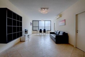 Apartment, 3 Bedrooms | Living area
