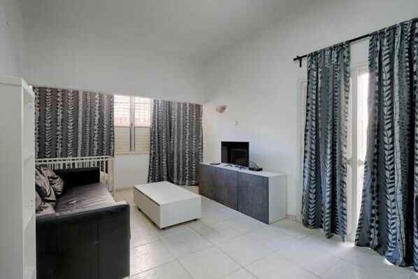 Apartment, 2 Bedrooms | Living room | Flat-screen TV - Appart'city Netanya - Hamatmid 9 (Netanya)