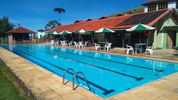 Indoor pool, outdoor pool, open 10:00 AM to 8:00 PM, pool umbrellas