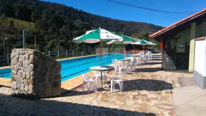 Indoor pool, outdoor pool, open 10:00 AM to 8:00 PM, pool umbrellas