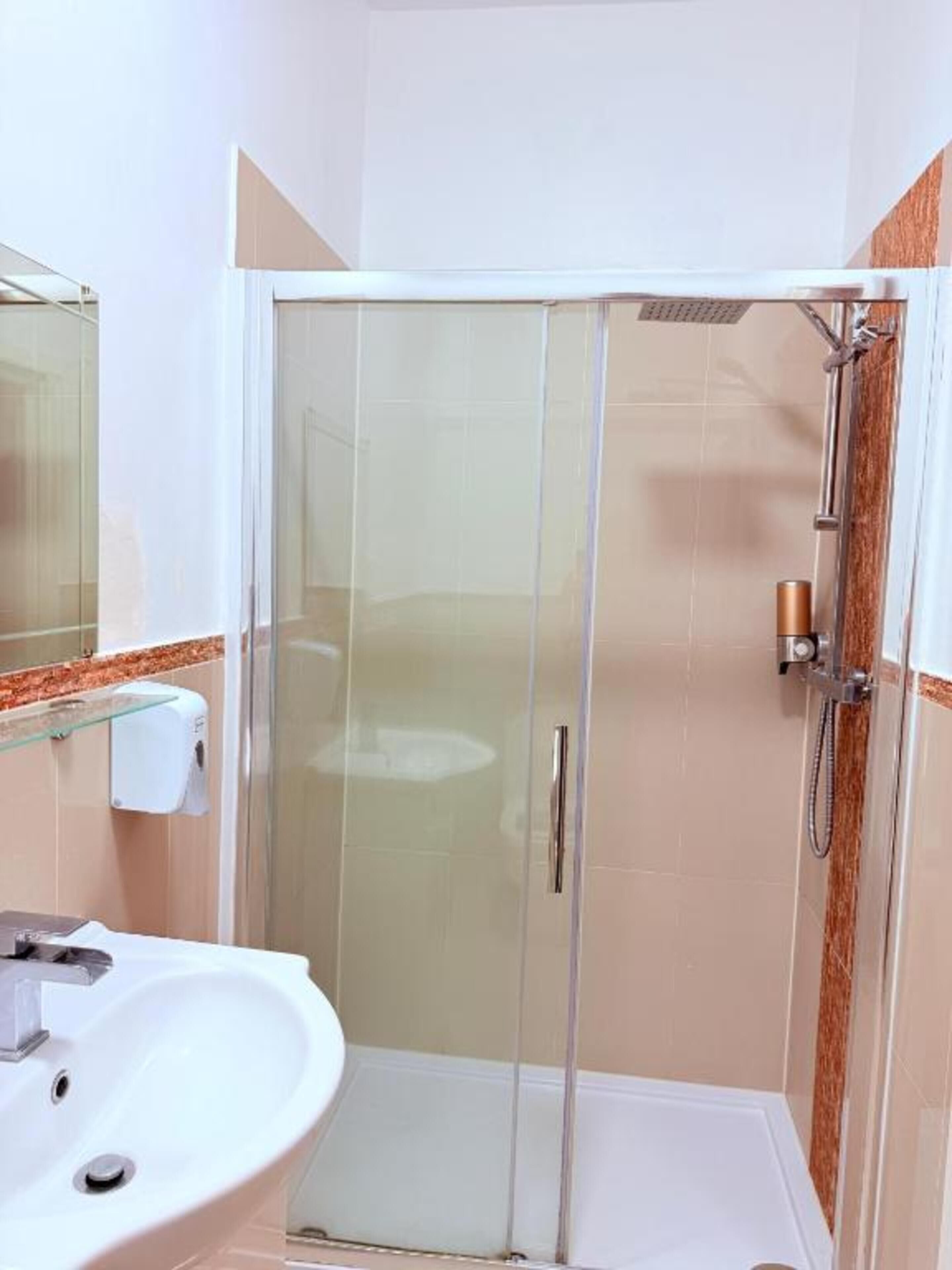 Shower, free toiletries, hair dryer, towels