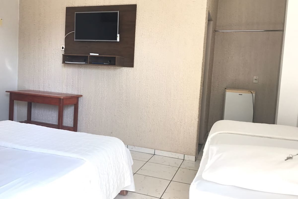 Minibar, desk, blackout curtains, iron/ironing board