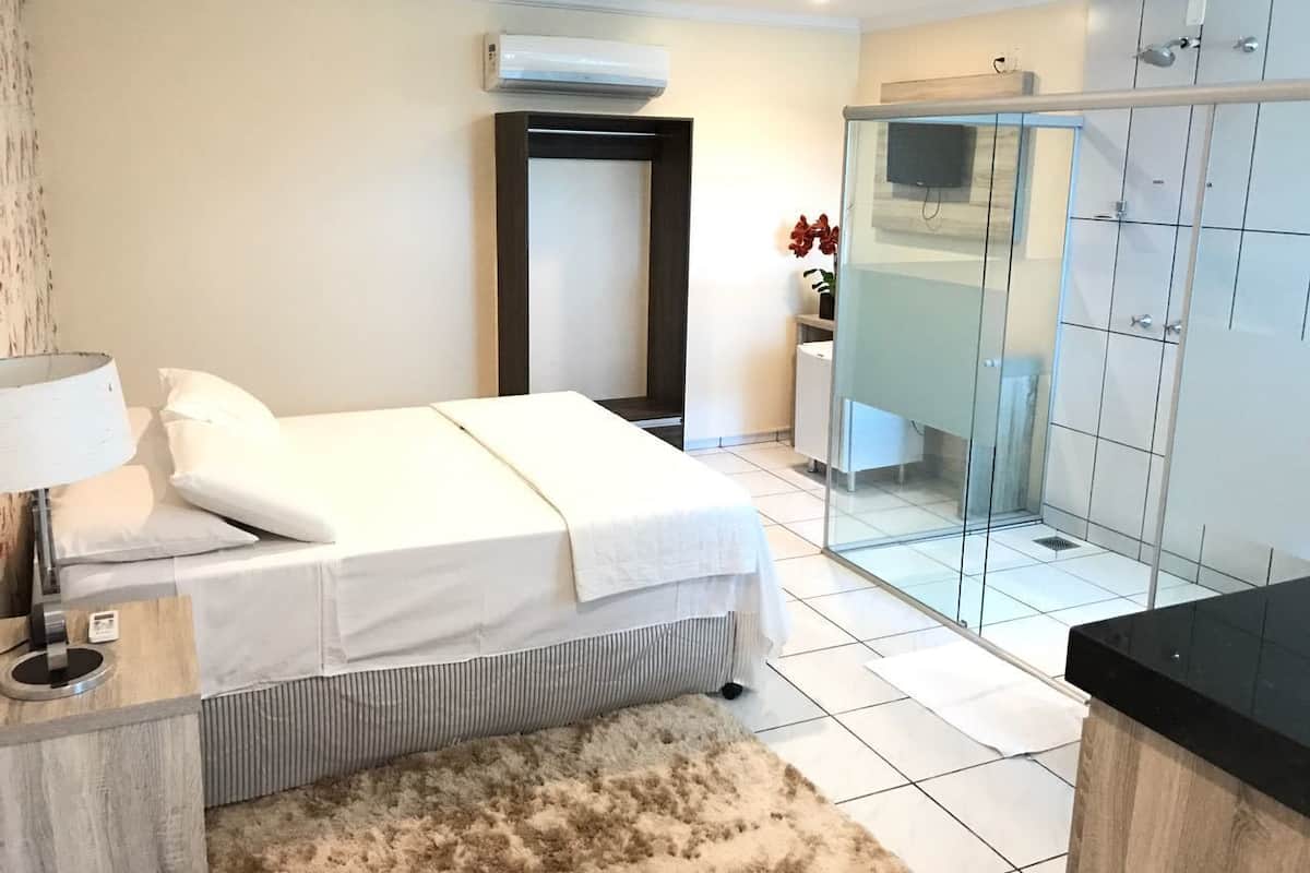 Minibar, desk, blackout curtains, iron/ironing board