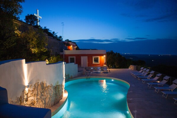 Seasonal outdoor pool, pool loungers