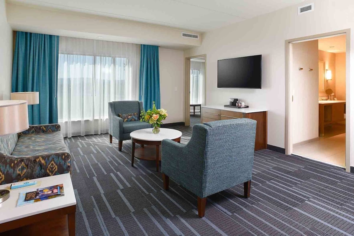 junior suite, 1 king bed, mountain view | premium bedding, in-room safe, desk, laptop workspace