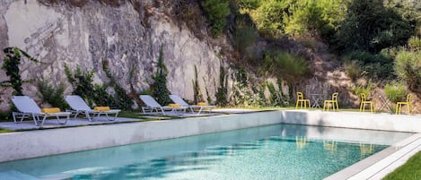 Outdoor pool, pool umbrellas, sun loungers