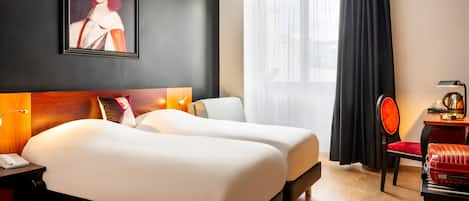 Pillow-top beds, minibar, in-room safe, desk