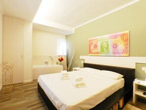 Apartment, 1 Bedroom, Jetted Tub | Individually decorated, individually furnished, desk, free WiFi