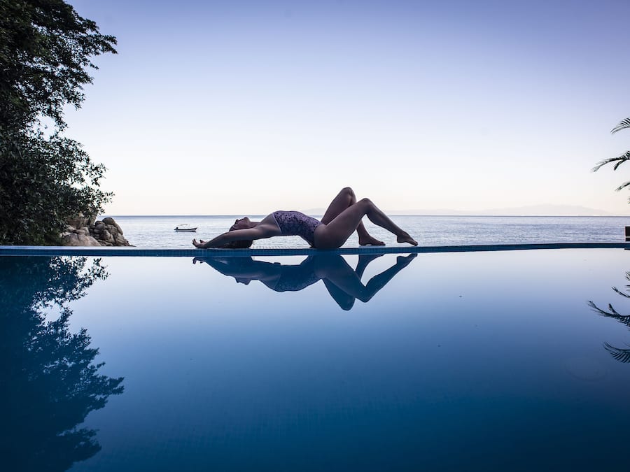 Outdoor pool, open 9:00 AM to 9:00 PM, pool umbrellas