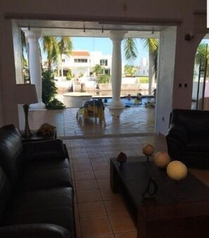 Family House, 3 Bedrooms, Marina View, Poolside | Living area | Flat-screen TV - Casa Cid (Mazatlán)