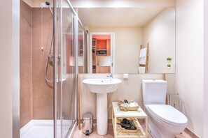 Shower, free toiletries, hair dryer, towels