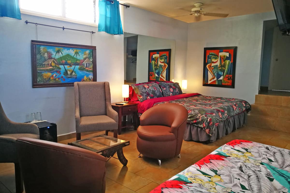 superior suite, multiple beds | in-room safe, individually decorated, individually furnished, desk
