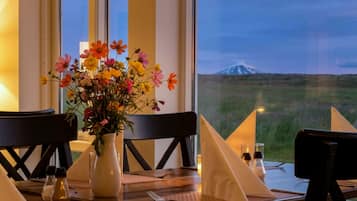 Breakfast and dinner served, local cuisine