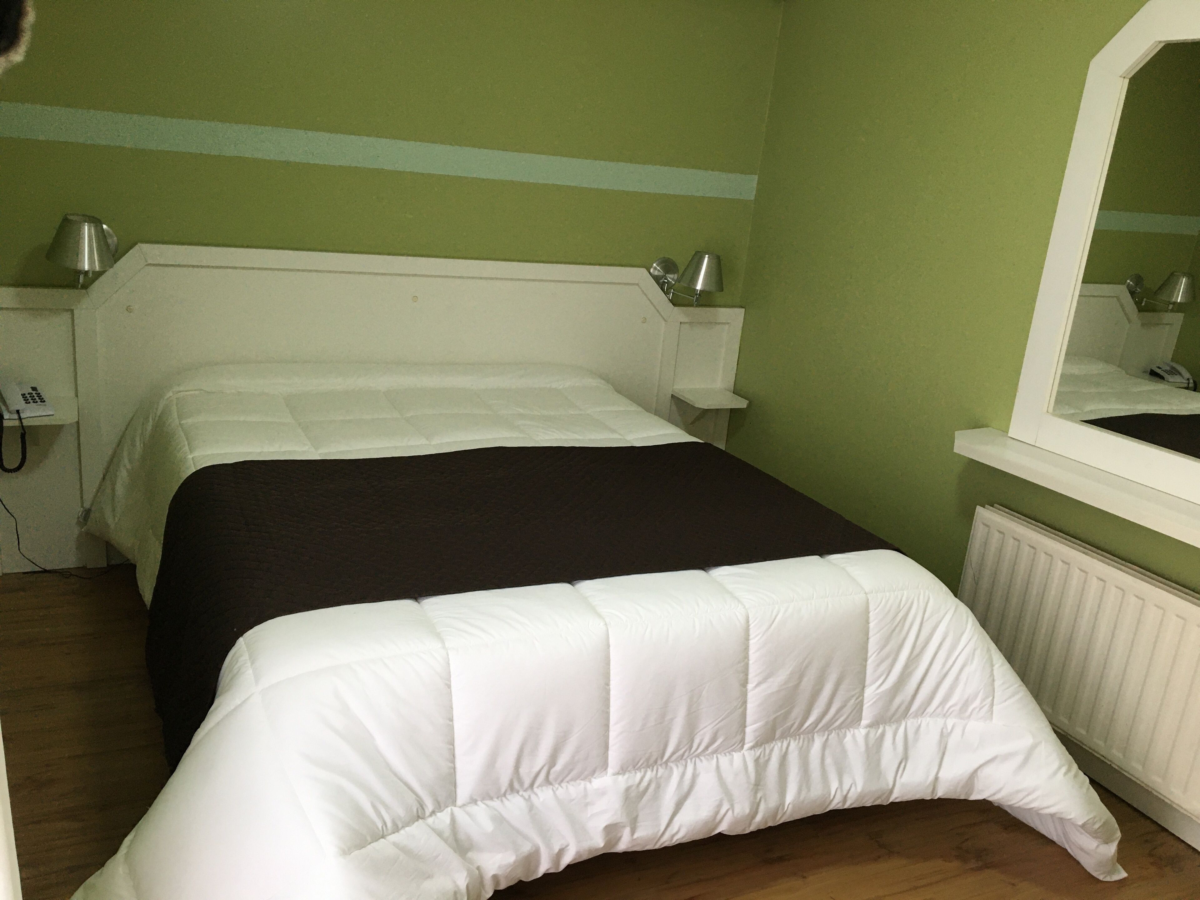 deluxe double room | minibar, desk, blackout curtains, iron/ironing board