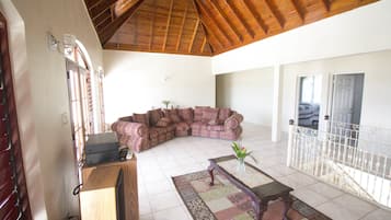 Family Villa, Multiple Bedrooms, Pool Access, Sea Facing | Living room | Flat-screen TV