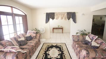 Family Villa, Multiple Bedrooms, Pool Access, Sea Facing | Living area | Flat-screen TV