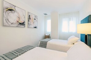 4 dormitorios, tabla de planchar con plancha, wifi y ropa de cama